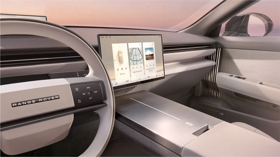 Painel do Range Rover GT elétrico com tela central flutuante, saídas de ar ocultas e revestimento em tecido trançado