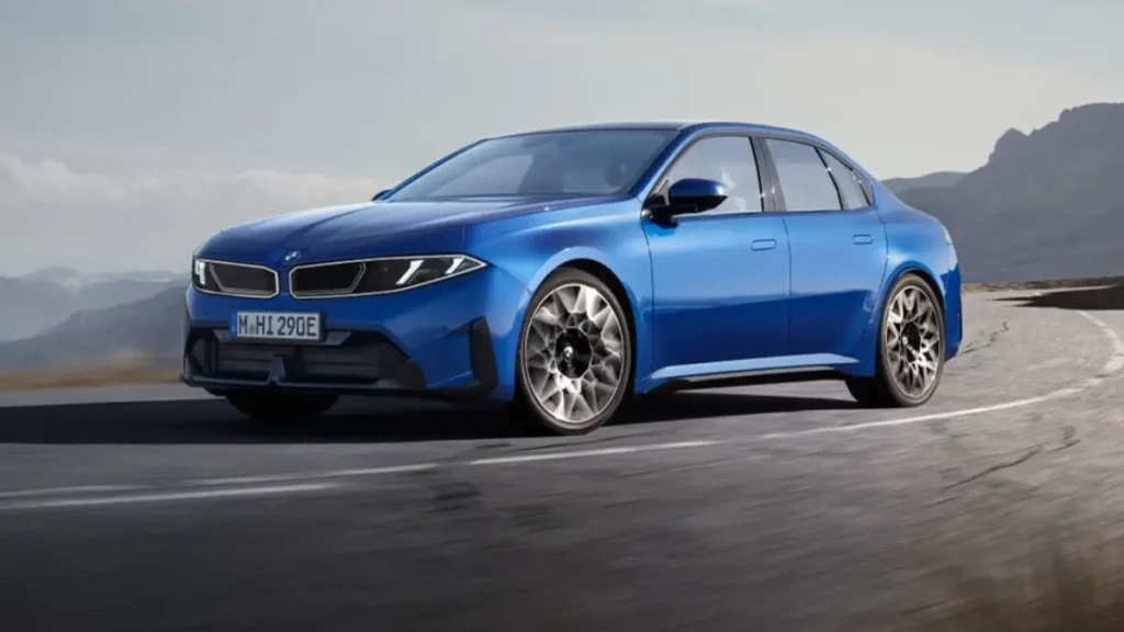 BMW azul em estrada de montanha.