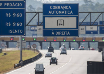 Pedágio rodoviário com cobrança automática e tarifa de R$9,60 em destaque.